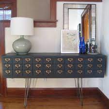 Eventually the mechanization of the modern era brought the efficiencies of card catalogs. Library Chic Card Catalog Furniture Furniture Diy Repurposed Card Catalog Library Card Catalog