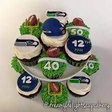 Cupcakes Take The Cake Seattle Seahawks 12th Man Cupcakes Where To Find Them Seahawks Cake Seattle Seahawks Cake Sports Themed Cakes