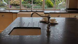 Steel gray leathered granite countertops with subway tile. Elegant Leathered Granite For Your Kitchen Countertop Design Idea Steel Grey Leathered Granite Countertop Wi Leathered Granite Granite Countertops Countertops