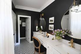 The modern, staggered brass chandelier in this example by interior designer lindye galloway is the perfect edgy touch for an elegant bathroom. 10 Can T Miss Bathroom Lighting Ideas With Photos Wayfair