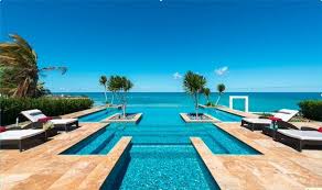 40 Sublime Swimming Pool Designs For The Ultimate Staycation Swimming Pool Designs Outdoor Pool Infinity Edge Pool