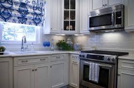 I purchased a roll of cork and double layered it, then added it to the inside panel of the cabinet interior, again using the 3m multipurpose adhesive. Hanssem Frosty White No Panels Next To Windows Kitchen New York White Cabinets Cabinet