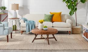 Jute rug with dark grey couch. Trend Alert Why You Need A Jute Rug Overstock Com