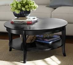 This simple iron coffee table works seamlessly with any existing interior. Chloe Round Coffee Table Coffee Table Round Coffee Table Coffee Table Pottery Barn