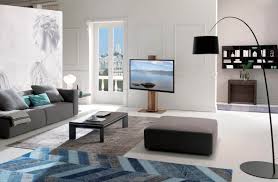 Glass top with internal extensions in various colors to match melamine. Ozzio Italia S Metrino Height Adjustable Coffee Table