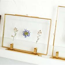 Best wall decor, it can showcase your photos, ies, poster on 2 pieces of glass in a floating way. Gold Standing Scandi Photo Frame The Coolest Picture Frames Ever The Perfect Frames For Displaying Memories Pressed Flowers Feathers Or Grey Marble Print Blush Marble Print Available With Stand To Display