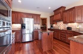 Solid Cherry Laminate Floor In Kitchen Flooring Ideas Floor Design Trends Kitchen Flooring Floor Design Flooring