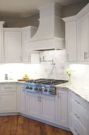White Shaker Cabinets Decorative Range Hood Inset Cabinet Trendy Kitchen Backsplash Kitchen Design Kitchen Layout