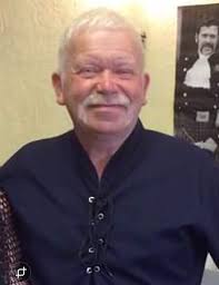 I came across this picture of pigeon fanciers while going through some  archives. I'm no sure who the guys are but names mentioned in the article  were Peter McGowan & suggested a