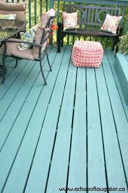 A plain backyard was transformed into a balinese paradise with the addition of a dining deck and outdoor table. A Deck Makeover Echoes Of Laughter Deck Paint Colors Painted Outdoor Decks Deck Makeover