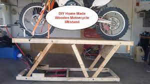 Our favorite motorcycle lift table is made mainly out of wood, but it doesn't feature the same mechanical action as a professional lift table. Diy Home Made Wooden Motorcycle Lift Stand Table Under 20 Almost Ready Motorcycle Lift Table Home Diy Motorcycle Diy