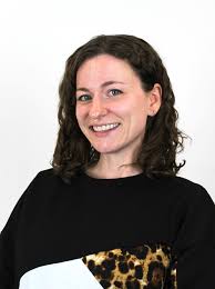 Yesterday, Erin Cho, a 16-year-old sophomore from Ames High School, was  named the winner of the Iowa Education License Plate Design Challenge  during a surprise ceremony by Director McKenzie Snow. At the