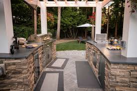 Distributing stainless steel products like gas and charcoal grills, storage access doors, side burners, drawers, refrigerators, ice makers, sinks and faucets. Outdoor Grill Islands Paradise Restored Landscaping