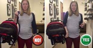Turn the car seat so your baby is facing you. Are You Carrying Your Baby S Car Seat The Right Way