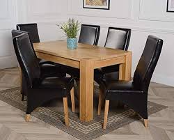 Oak dining table with black leather chairs. Oak Furniture King Kuba 150 X 85 Cm Chunky Medium Oak Dining Table And Maraz