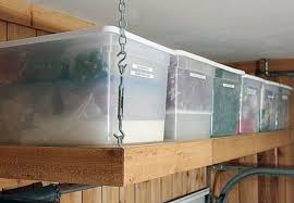 The best way to hide the mess in the garage is to use ceiling mounted storage racks like the one from flexmount. Diy Garage Shelves 5 Ways To Build Yours Bob Vila