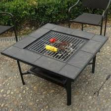 It boasts a lot of nifty features, the most impressive of which include a refrigerated drawer, bluetooth speakers, charging ports, and led lights. The Woodburning Fire Pit Table Grill Cooler Lets You Take Charge Of Your Outdoor Living Space This Rust Resistant Fire Pit Coffee Table Cooler Fire Pit Table