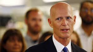 As Gov. Rick Scott lays low, his poll numbers go higher