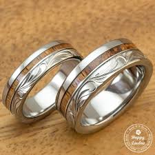 Titanium Wedding Band Set With Hawaiian Koa Wood Inlay Hand Engraved With Hawaiian Heritage Design Titanium Wedding Band Sets Couple Wedding Rings Wedding Rings Unique