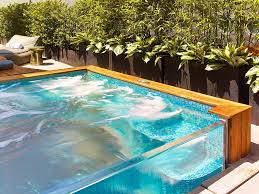 Stainless Steel Spa With Clear Vinyl Front Skirt And Clear Bottom Foot Well With Water Spill Over Water Feature And Auto Cover 1 Swimming Pools Glass Pool Pool