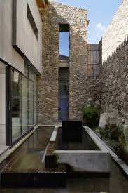 Use them in commercial designs under lifetime, perpetual & worldwide rights. Spanish Stable Turned Contemporary Stone Home