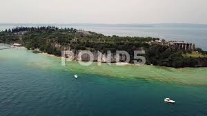 Please wait don't forget to add. Jamaica Beach Sirmione Garda Lake Drone Stock Video Pond5