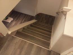 Nosing is the horizontal, protruding edge of a stair where most foot traffic frequently occurs. Drop Done Luxury Vinyl Plank In Eastern Township With Metal Insert Stair Nosing Laminate Stairs Stair Nosing Stairs Vinyl