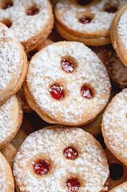 This traditional austrian cookie is made of a kind of shortbread dough and simply melts in your mount, filling it with nutty goodness. Austrian Linzer Cookies Recipe Video Masalaherb Com