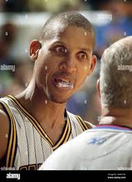 Indiana Pacers' Reggie Miller, right, shoots over Cleveland Cavaliers'  Derek Anderson in the opening game of the NBA first round playoff in  Indianapolis, Thursday, April 23, 1998. The Pacers lead the best-of-five