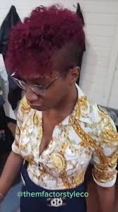Woman with Fresh Mohawk Style with V Design in Back