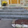 A set of steps poured using liners on the inside of our step forms to create the look of real stone and slate steps. 1