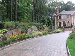 Explore trending landscaping ideas with rocks for small and big gardens trending in 2021. Driveway Design Ideas Landscaping Network