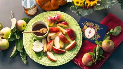 Apples and honey served for a sweet Jewish New Year.