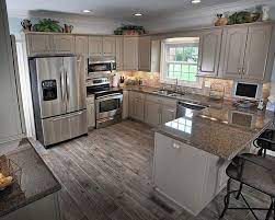 Check out these kitchen layouts with peninsulas to find your perfect this gallery showcases gorgeous kitchen peninsula ideas from a variety of design styles. Small Kitchen With Peninsula And Recessed Lighting Over Kitchen Cabinets Kitchen Remodel Small Kitchen Design Small Kitchen Layout