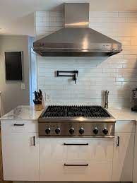 Love how this kitchen renovation creates an open feel for our clients to their dining room and office and a better transition to back yard! White Brick Backsplash Fireclay Tile