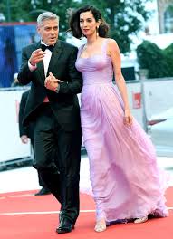 George and amal clooney announced on wednesday that their foundation would be donating $100,000 to the young center for immigrant children's rights. George Clooney Reveals Why He Hates Hollywood Baby Names And Says Daughter Ella Is The Spitting Image Of Amal