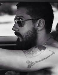 The Giraffe Riding A Bike Tattoo Is So Awesome Shia Labeouf Shia Labeouf Tattoo Shia
