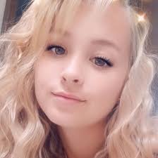 Garage sale at 154 W Warren St with discounted clothing and jewelry