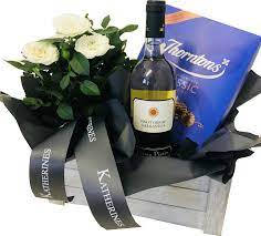 Carefully selected flowers & gifts with free next day delivery, be there from anywhere with bloom & wild. Luxury Red White Rose Wine Hamper Katherine S Florists