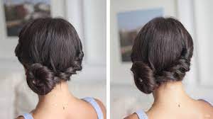 Leaving two sections of hair from the sides, gather the rest of your hair and tie it in a long bun at the back. Easy Twisted Side Bun Youtube