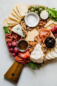 Use kraft cheeses and serve them with crackers and fruit to create the cheese tray. How To Make A Cheese Plate With Step By Step Photos