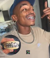 LeeMcKrazy shows off his new set of grillz 😁💎🔥