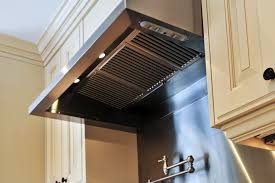 We have an old and rusty range hood in our kitchen that needs to be replaced. How To Clean The Range Hood Over Your Stove Oven Or Microwave Epicurious