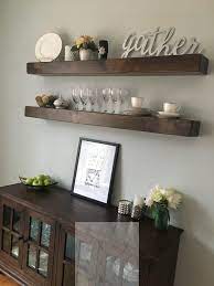 Floating shelves not only provide a room with a place to put your things, but when mounted correctly they can look fun, sleek and even a bit sophisticated. Dumbfounding Useful Ideas Floating Shelf Desk Fireplaces Floating Shelves Shanty 2 Chic Tut Small Dining Room Decor Dining Room Wall Decor Dining Room Shelves