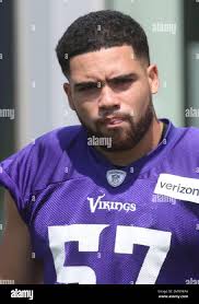 Minnesota Vikings linebacker Devante Downs heads to NFL football practice  in Eagan, Minn., Saturday, July 28, 2018. (AP Photo/Jim Mone Stock Photo