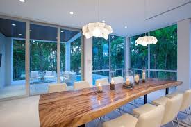 The most important furniture in a dining room is obviously the dining table with the chairs surrounding it making space for the family and friends to sit. 12 Seater Wood Slab Dining Table Slab Dining Tables Dining Room Contemporary