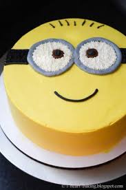 Continue by adding in this order; Make A Delightfully Despicable Minion Cake