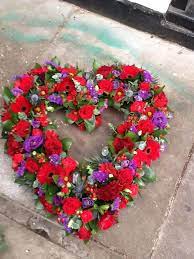 Can be made with different colours. Beautiful Red And Purple Heart Tribute Made By Scentsational Flowers X Funeral Flowers Sympathy Flowers Funeral Floral
