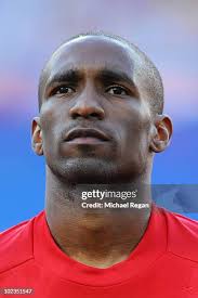 John Terry lines up for the national anthems prior to the 2010 FIFA... News  Photo