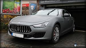 Research the maserati ghibli and learn about its generations, redesigns and notable features from each individual model year. Autofolierung Maserati Ghibli Dark Grey Car Wrapping 21
